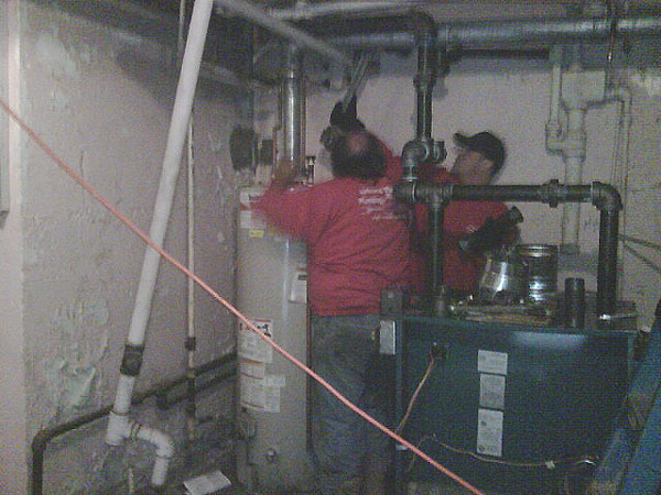 Airco Home Comfort Services- Working on a broken furnace
